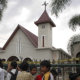 Indonesia: Muslim marauders burn churches and batter a Christian pastor