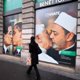 Vatican takes legal action over pope-imam kissing ad