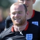 Football official stops Wayne Rooney from sharing too much about his faith